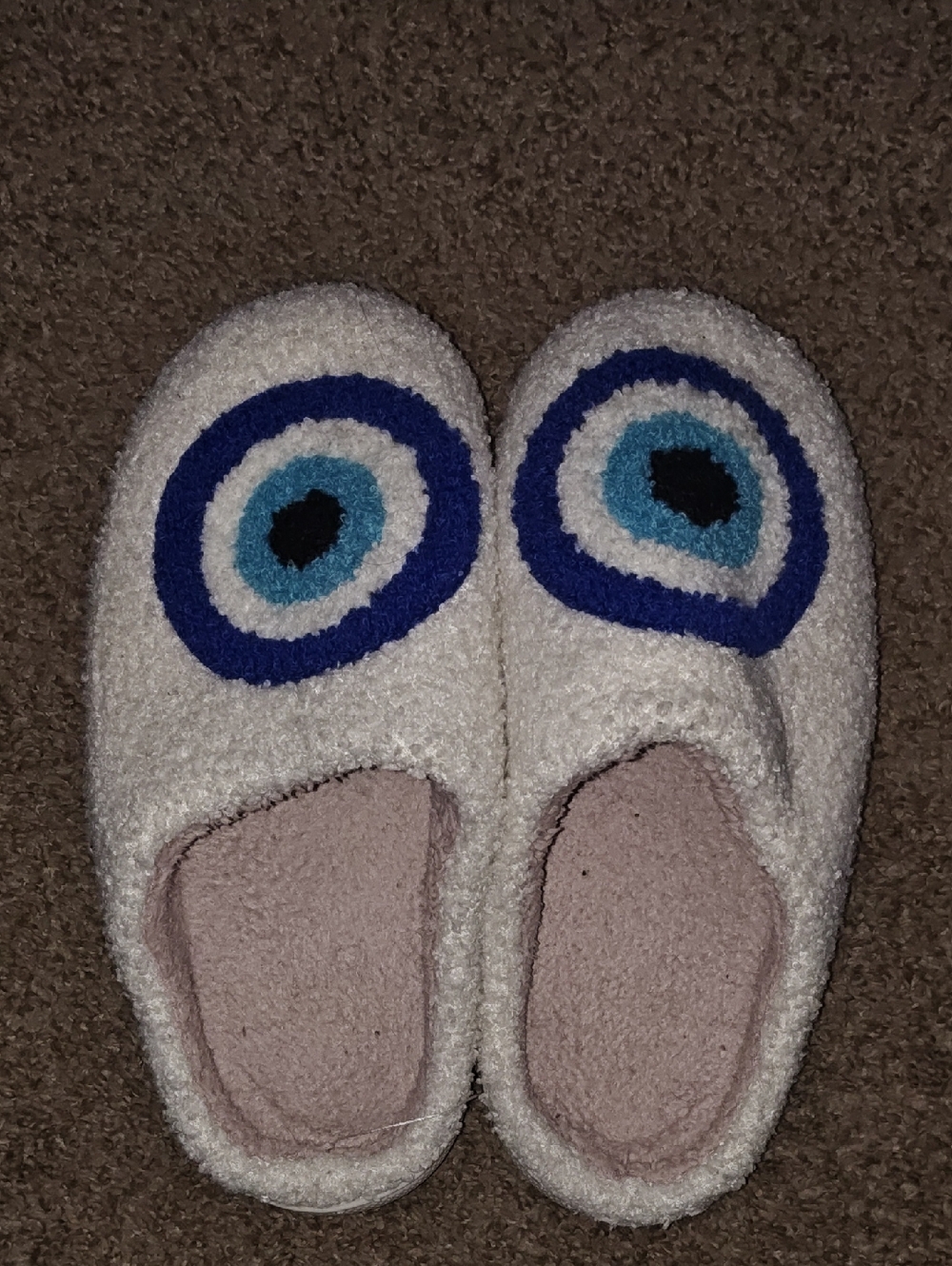 Cozy White Fuzzy Slippers with Blue Target Design